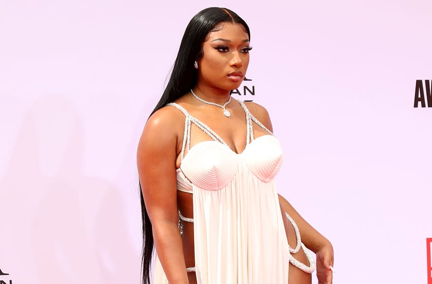  Megan Thee Stallion Opens Up About Going From Darkness To Strength Through Fitness